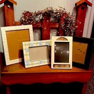 Lot of picture frames glass! Beautiful, ceramic, wood and pod w pressed flowers!